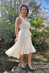 RALUCA MIHALCEANU white cotton dress in midi length with ruffles and tie belt